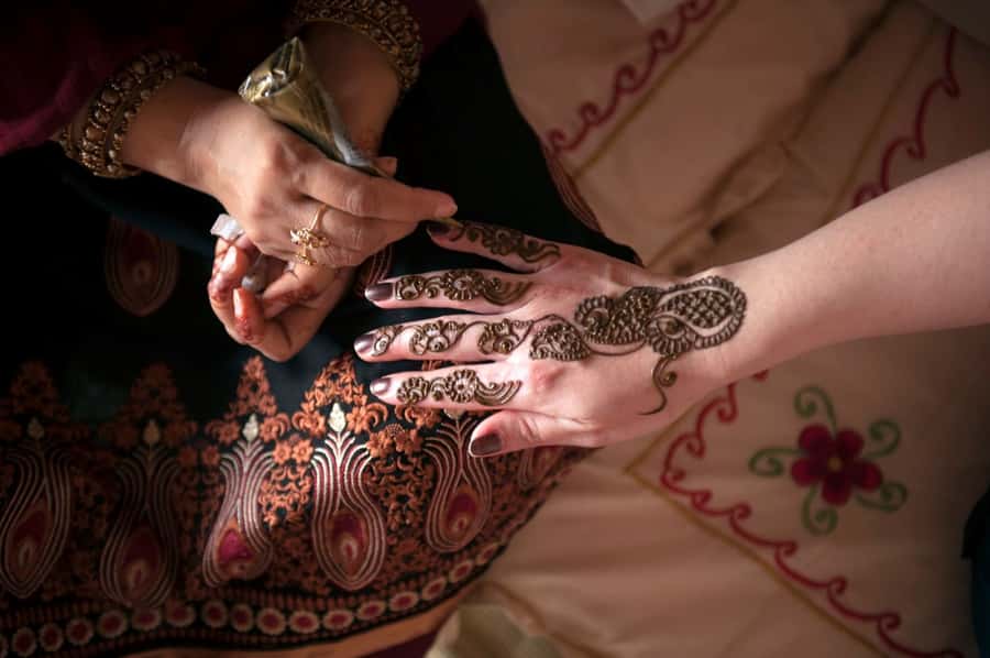 Dubai: Desert Safari, Camel Ride, and BBQ Dinner - Camel ride, henna, and desert customs