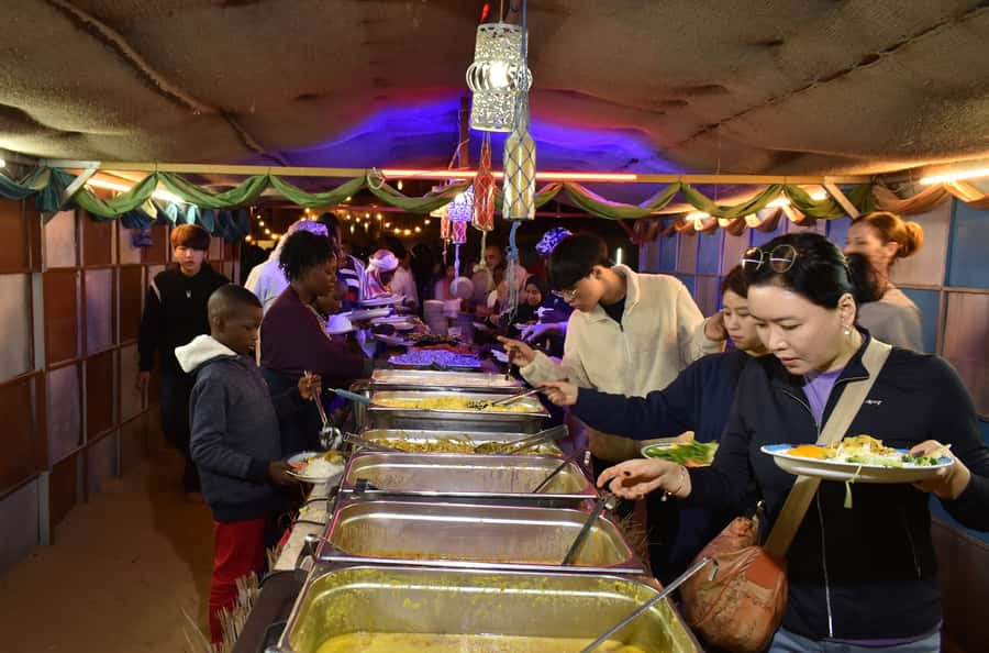 Dubai: Desert Safari, Camel Ride, and BBQ Dinner - BBQ dinner under the night sky