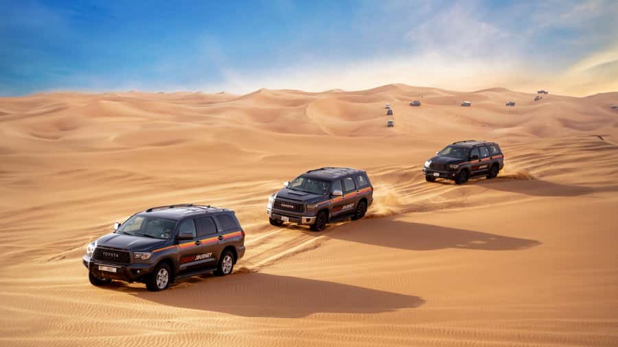 Dubai Desert Safari - Camel Ride, Sandboarding & 30 Min Quad - The highest dune, sandboarding, and photo time
