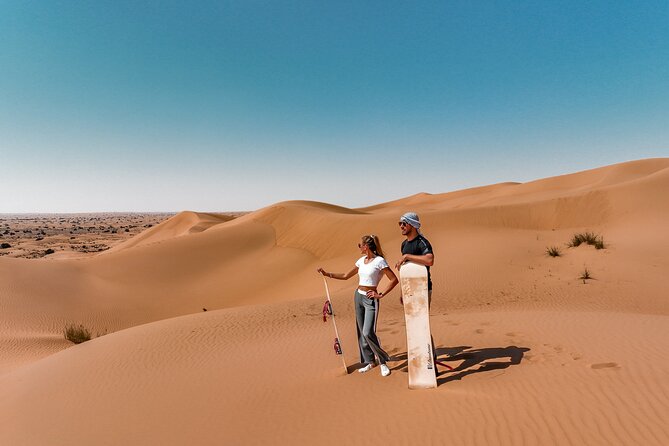 Dubai Desert Safari: Camel Ride, Sandboarding, BBQ & House Drinks - From Dubai hotels to the open dunes