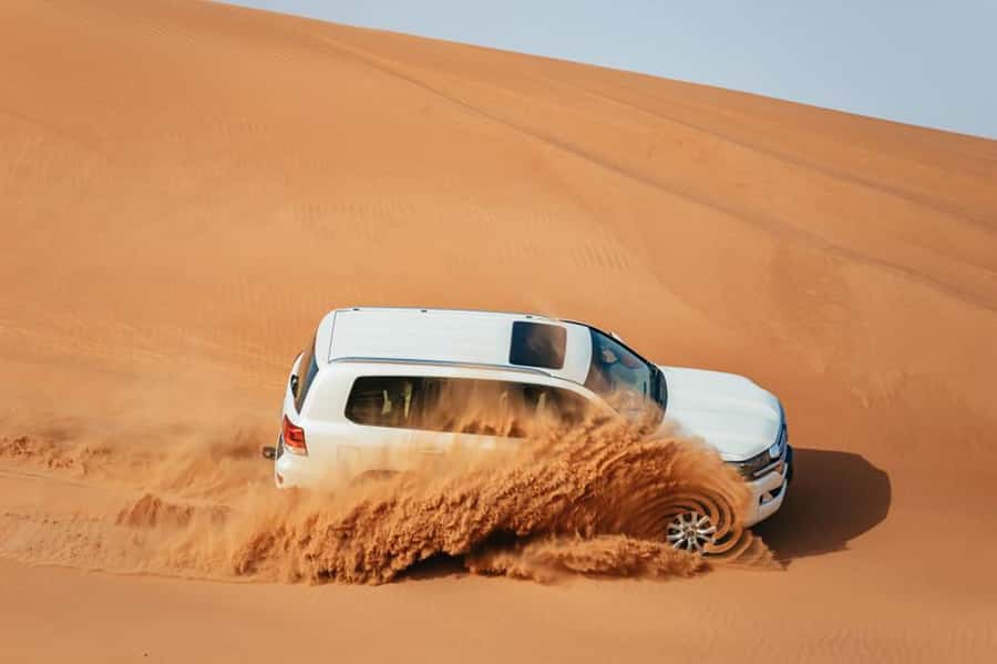 Dubai: Desert Safari, Camel Ride, Sandboarding, Quad Bike - Quad biking at Lahbab