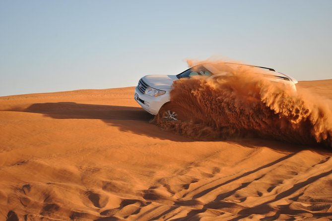 Dubai: Desert Safari, Camel Ride, Show & Optional Dinner - Forty minutes of dune bashing in a Land Cruiser