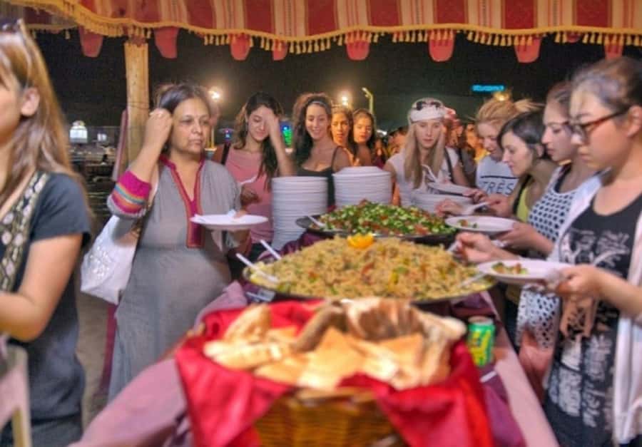 Dubai: Desert Safari Camel Riding, Sandboarding & BBQ Dinner - BBQ dinner and live entertainment