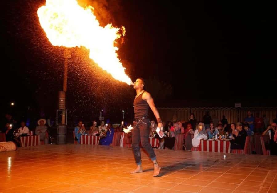 Dubai: Desert Safari Camel Riding, Sandboarding & BBQ Dinner - What the guides add to the day