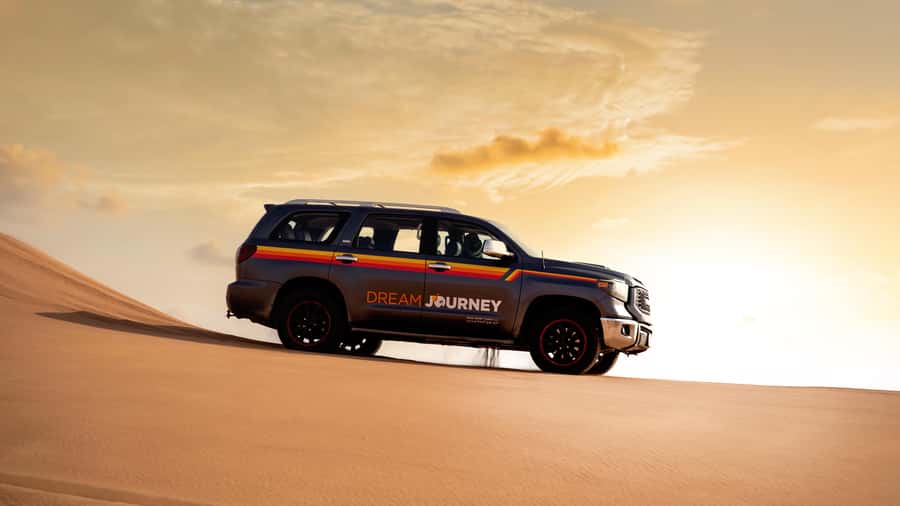 Dubai Desert Safari - Premium BBQ Dinner, Camel Ride & Shows - Leaving Dubai for the red dunes
