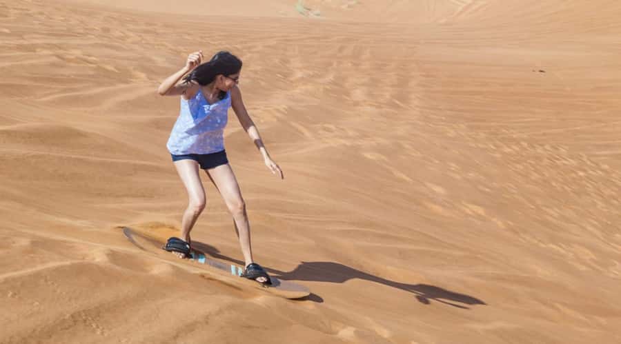 Dubai: Desert Safari, Quad Bike, Camel Ride and Sandboarding - Leaving Dubai for the red dunes of Lahbab