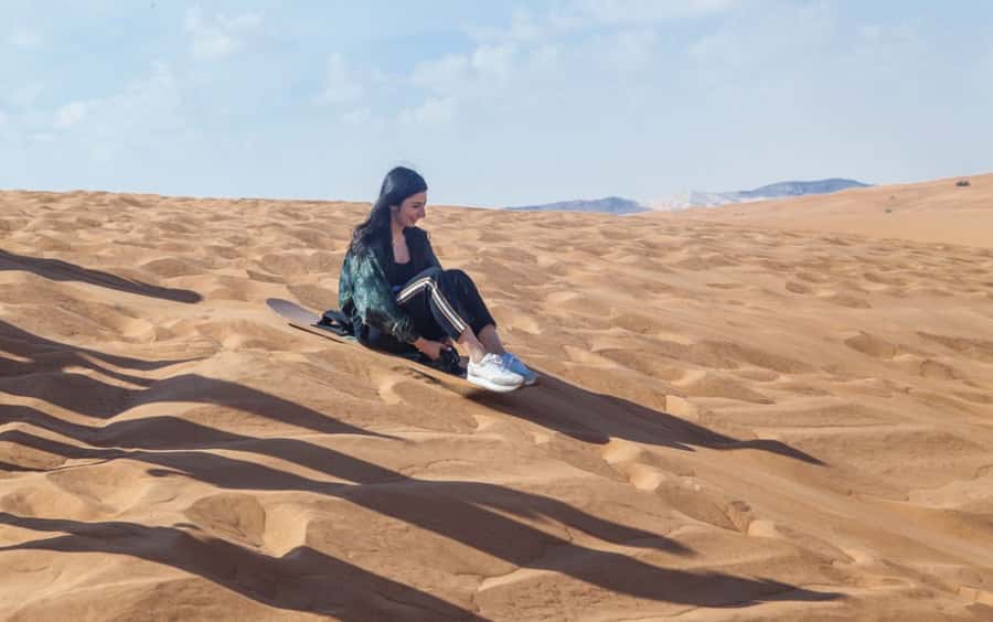 Dubai: Desert Safari, Quad Bike, Camel Ride and Sandboarding - Sandboarding and the high-dune photo stop