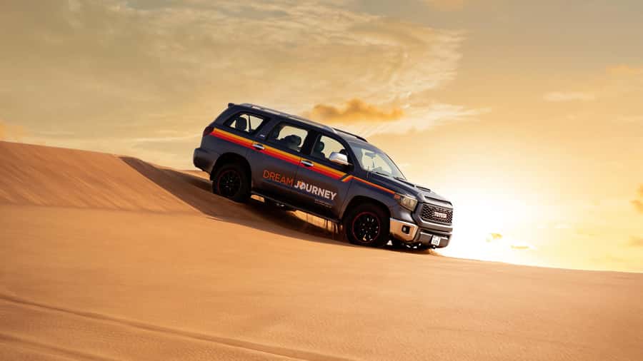 Dubai Desert Safari - Sandboarding, Quad Bike & BBQ Options - From your Dubai hotel to the red dunes of Lahbab