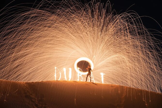 Dubai Desert safari Tour with Live BBQ & Belly Dance Shows - Al Aweer camp, camel ride, and desert customs