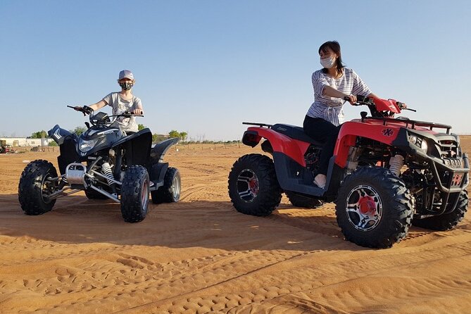 Dubai Desert Safari With BBQ, Quad Bike And Camel Ride - Quad biking across the Lahbab sand