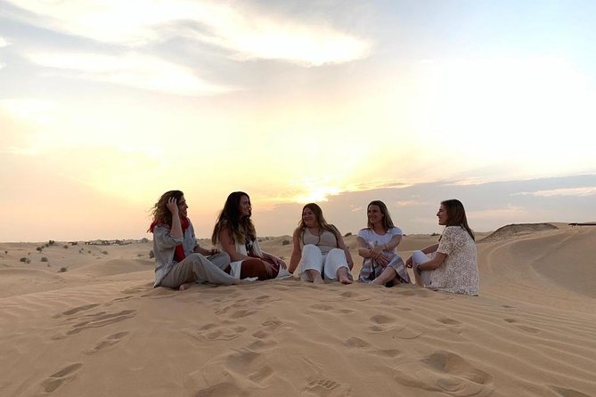 Dubai Desert Safari With BBQ, Quad Bike And Camel Ride - Tanura, belly dancing, and fire entertainment