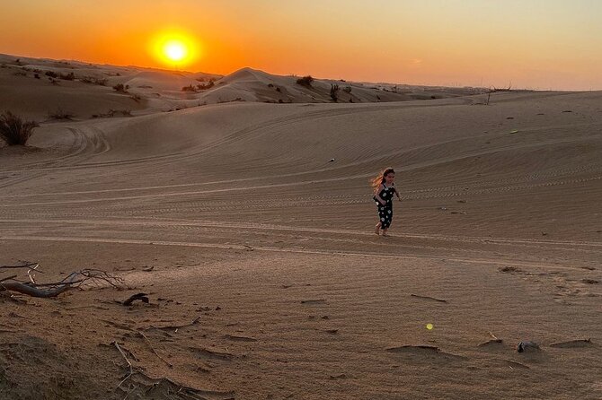 Dubai Desert Safari With Dune Bashing, Camel Ride & BBQ Dinner - Belly dance, Tanoura, and fire performances