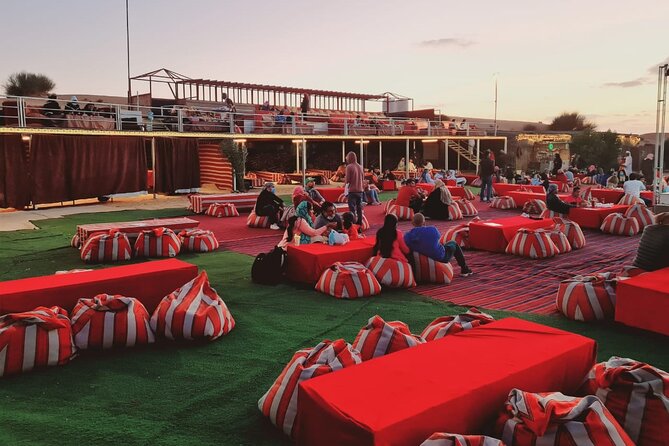 Dubai Desert Safari with Quad Bike, Camel Ride, Dinner and Show - Camel riding and sandboarding keep the pace varied
