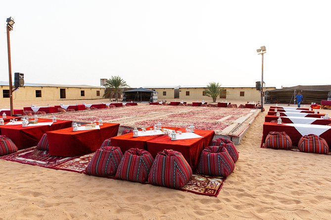 Dubai Desert Safari with Quads, BBQ Dinner, Camel ride, & Shows - BBQ dinner beneath the evening sky