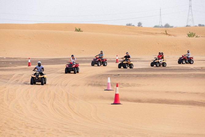 Dubai Desert Safari with Quads, BBQ Dinner, Camel ride, & Shows - Belly dancing and tanoura after dark