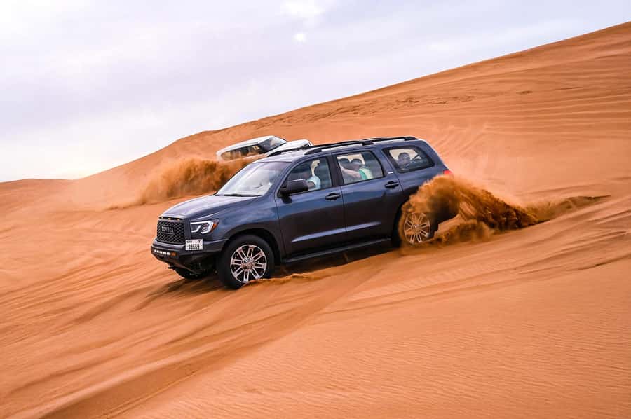Dubai: Desert Safari with VIP BBQ and Optional Quad Bike - Leaving Dubai for Al Lahbab’s red dunes