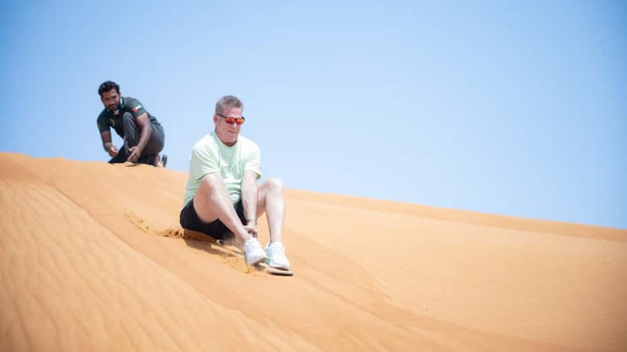 Dubai: Dune Buggy Safari and Camel Ride with Transportation - Sandboarding and the limits of a short camel ride