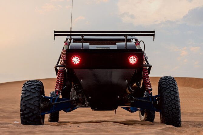 Dubai Dune Buggy Safari Tour in Red Dunes Options - Sandboarding, camels, and the desert camp