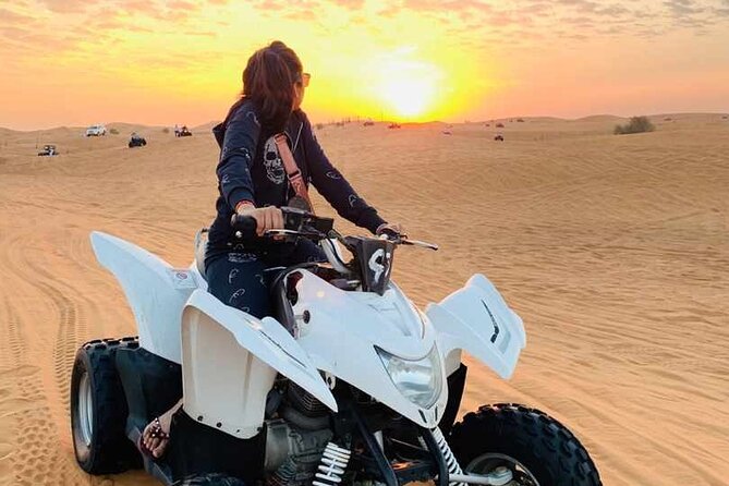 Dubai Dunes Safari With Quad Bike, Camel Ride, BBQ Dinner & Live Shows - Sandboarding adds a short, playful stop