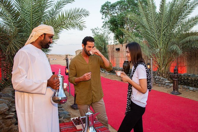 Dubai Evening Desert Safari: Sandboarding, BBQ, Camel Ride & more - Practical clothing and timing advice