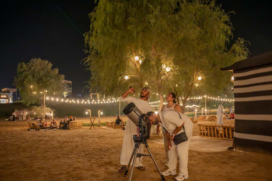 Dubai: Evening Desert Safari with Camel Ride & Stargazing - Hotel pickup and the 45-minute ride out