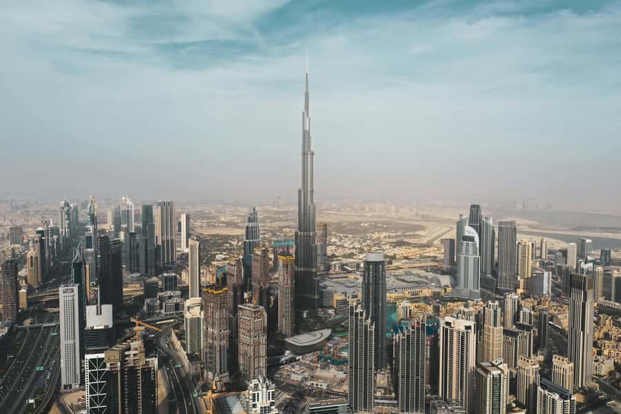 Dubai: Full Day Private Tour & Optional Burj Khalifa Tickets - Dubai Frame and the Shift Toward Old Dubai