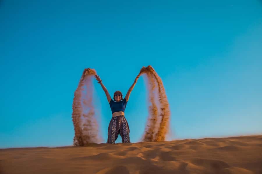 Dubai: Half-Day Desert Safari, Camel Ride, ATV & Dune Buggy - Falcon photos add a traditional desert touch
