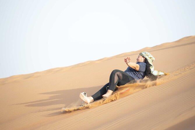 Dubai Half-day Red Dunes bashing with Sandboarding, Camel &Falcon - What $34.89 really buys you
