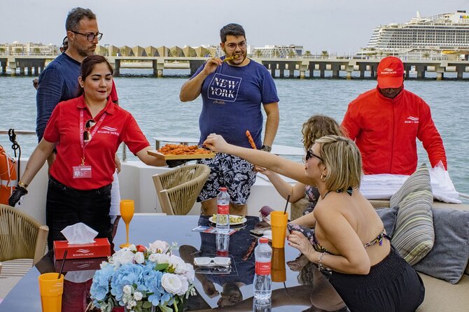 Dubai Harbour Super Yacht Experience with gourmet & Drinks - Music, clothing, and the mood on board