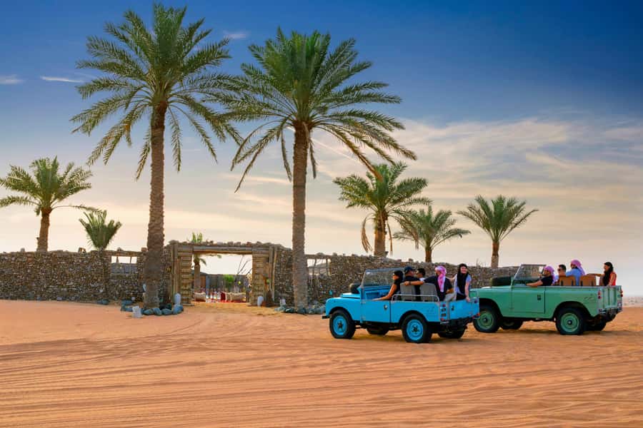 Dubai: Heritage Safari in Vintage Land Rover with Dinner - Falconry with the sun going down