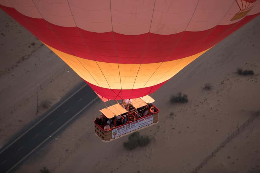 Dubai: Hot Air Balloon Ride & Falcon Show Over the Desert - Weather, rescheduling, and the early start