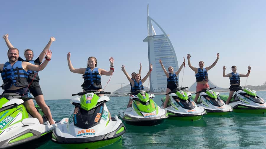 Dubai: Jet Ski to Atlantis with Videos, Photos and Ice Cream - The Palm beach pause and the distant Burj Khalifa