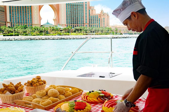 Dubai Marina Yacht Tour with Optional Breakfast or BBQ - The Burj Al Arab photo stop