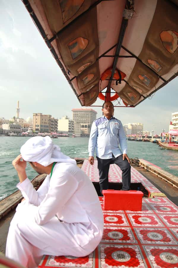 Dubai: Old City Walking Tour with Abra Ride - The Old Textile Market and the walk to the creek
