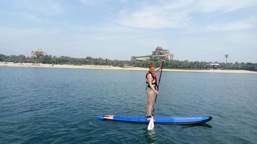 Dubai: Palm Jumeirah Paddle Boarding Tour - Atlantis photos, skyline views, and a quick swim