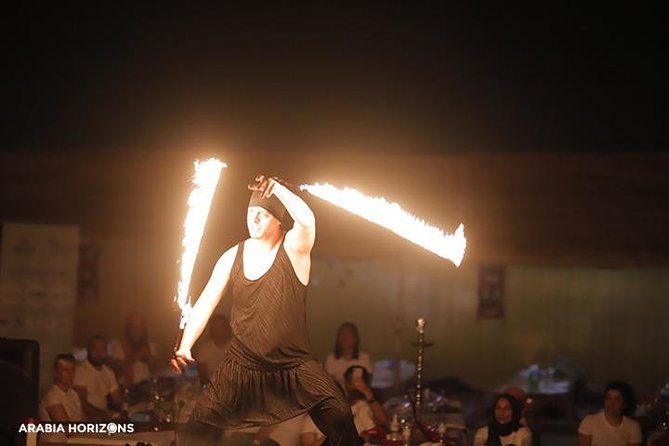 Dubai Premium Desert Safari with Live shows & Gourmet Dinner - Arabic coffee, dates, henna, and falcon photos