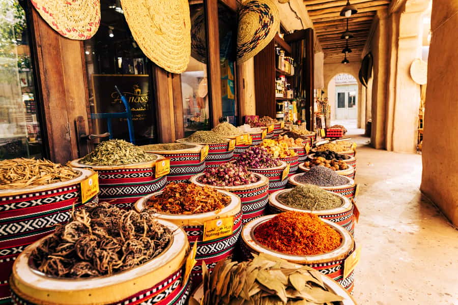 Dubai: Premium Old Town, Street Food, Souks & Boat Ride Tour - Walking through Al Fahidi Historical Neighborhood