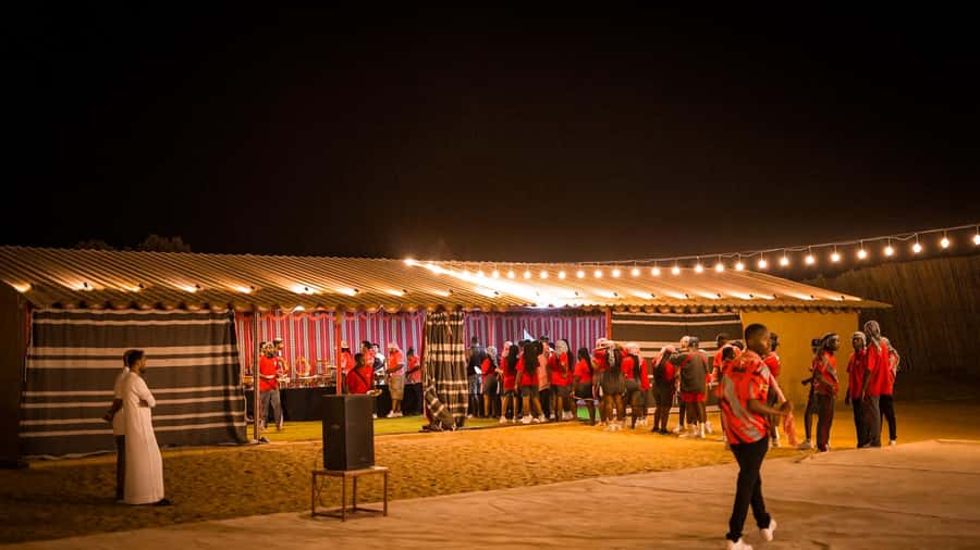 Dubai: Premium Red Dune Safari with Sandboarding & BBQ - BBQ dinner, drinks, and the evening show
