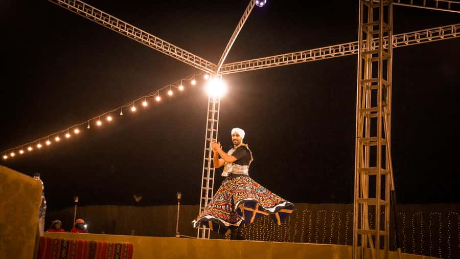 Dubai: Premium Red Dune Safari with Sandboarding & BBQ - Sandboarding and desert photographs
