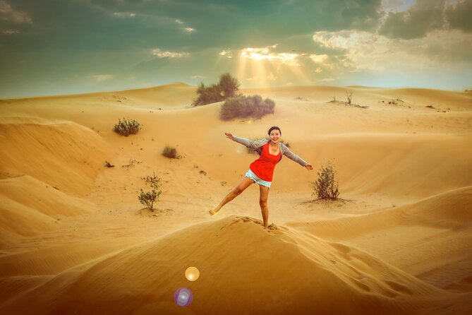 Dubai Premium Red Dunes Safari, Camels & 5<em> BBQ at Al Khayma camp – The drive from Dubai to Lahbab’ /></p>
<p><p>Pickup is offered from selected addresses in Dubai, Sharjah, and Ajman, with possible extra charges for some locations. Your driver may arrive within 45 minutes before the chosen departure time, and the schedule can shift with summer heat. Check your messages, stay reachable, and wait in the hotel lobby on time. A missed pickup can mean losing the entire outing.</p>
</p>
<p><p>The ride to Lahbab takes about an hour in an air-conditioned 4WD. This transfer is more than dead time when the driver is in a talkative mood. Rashid Mir has been praised for explaining Dubai’s development, pointing out buildings and palace areas, and sharing his pride in the city. Other named drivers, including Yusir, Abid Wahid, Sunil, Shams, Sarg, and Tofeeq Abbas, have also been praised for humor, information, organization, and good photography.</p>
</p>
<p><p>You should eat two or three hours before pickup, not immediately before it. The advice is practical because dune bashing can unsettle your stomach. Bring water, though unlimited water and soft drinks are supplied during the tour.</p>
</p>
<h2>Lahbab and the red-dune ride</h2>
<p><img width="669" height="446" decoding="async" src=