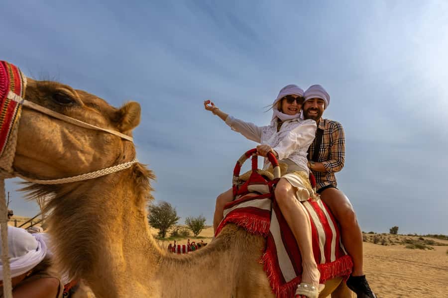 Dubai: Premium Safari, Camel Ride & Al Khayma Camp 3-Buffets - Shows as the desert turns dark