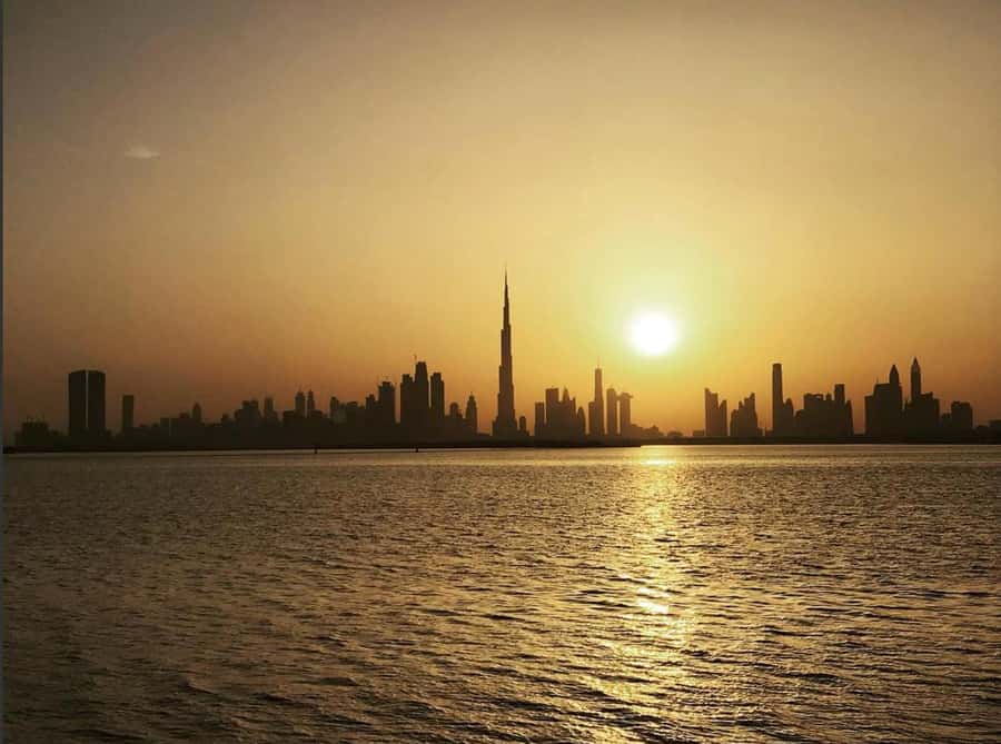 Dubai: Private Creek Harbour and Water Canal Cruise - The first views toward Burj Khalifa