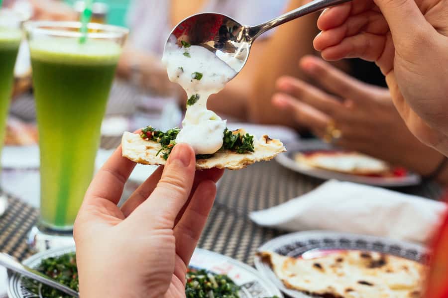 Dubai: Private Food Tour – 10 Tastings with Locals - Ten tastings, from familiar falafel to camel burger