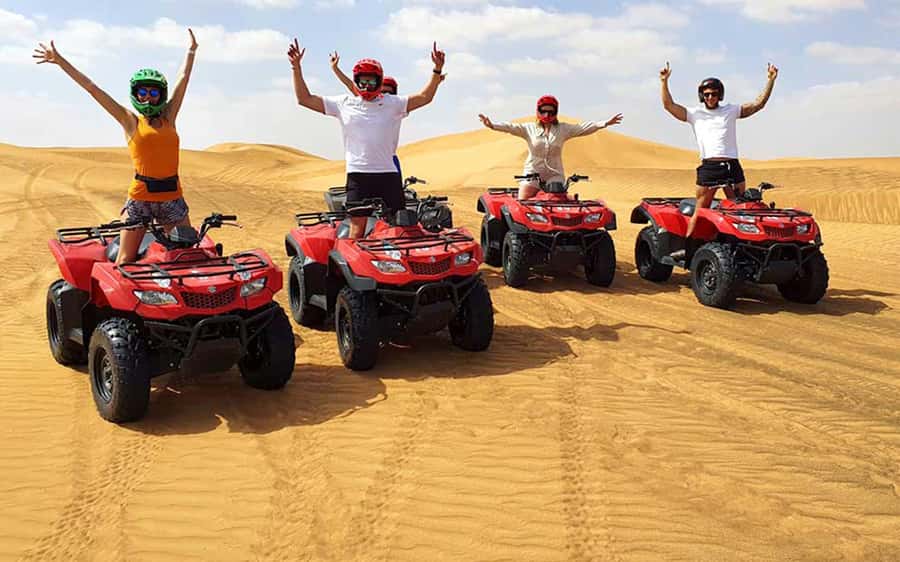 Dubai: Quad Bike, Dune Buggy, and Sandboarding Experience - Sandboarding on the red dunes
