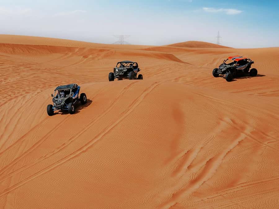 Dubai: Quad Bike or Dune Buggy Adventure & Optional Transfer - Add sandboarding if you want more than motor power