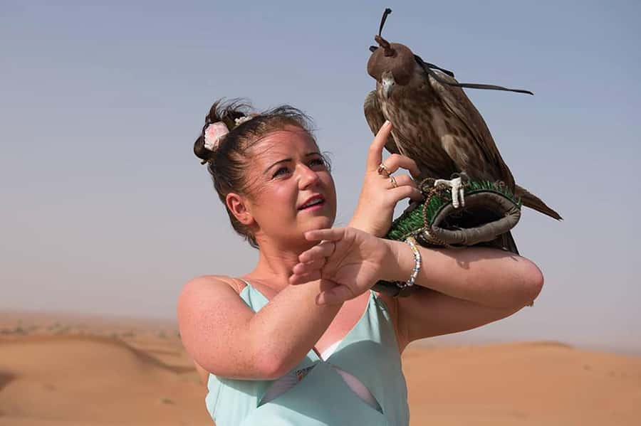 Dubai: Red Dunes Desert Safari with Premium Camp BBQ & Shows - Entering the premium camp with coffee and dates