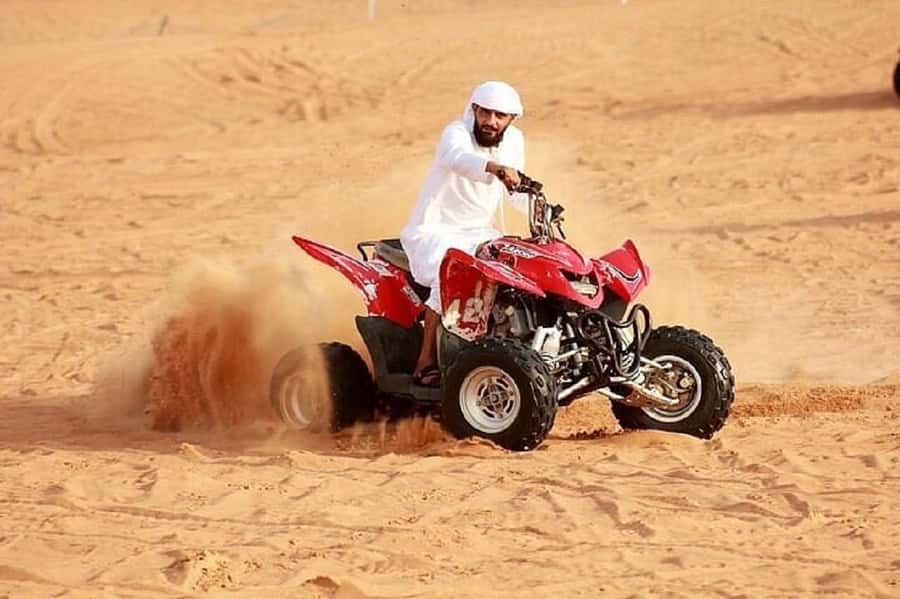 Dubai: Red Dunes Evening Quad Bike, Dune Blast with BBQ - Three hours at the desert camp
