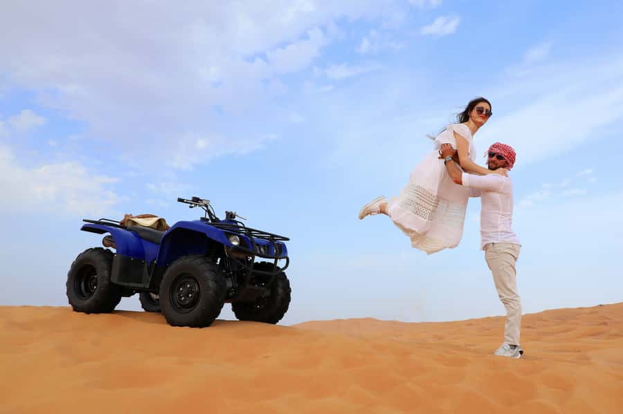 Dubai: Red Dunes Quad Bike with Sandboarding, Camels and BBQ - Key points to know before booking
