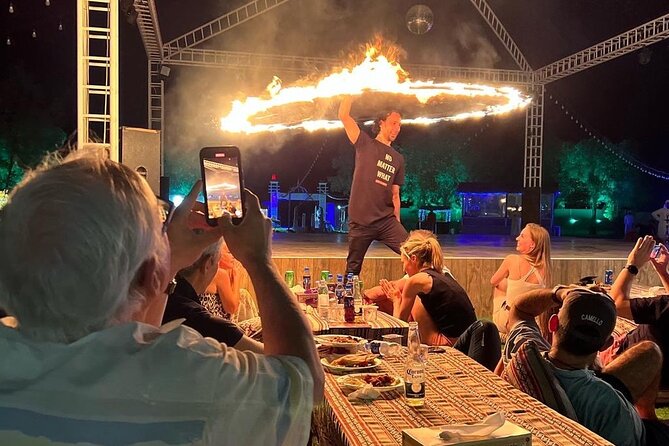 Dubai: Red Dunes, Sandsurf, Camel Ride, BBQ Dinner at Desert Camp - Four kinds of live entertainment