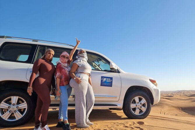 Dubai Red Dunes with Sandboarding, Camel Ride, Falcon & VIP Camp - A short camel ride with a traditional feel